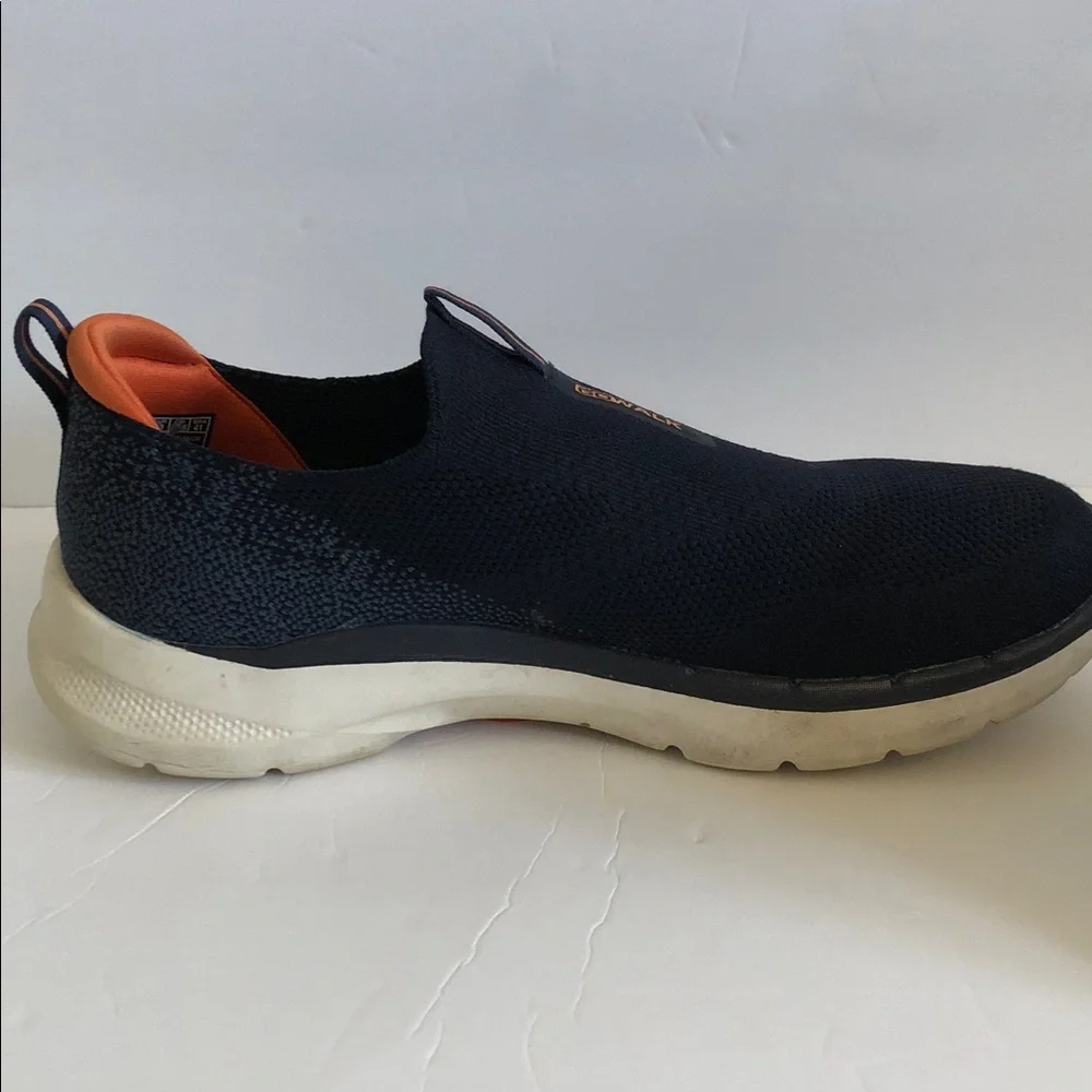 Skechers Slip-On GoWalk Men’s Knit sneakers in Navy with Orange Trim